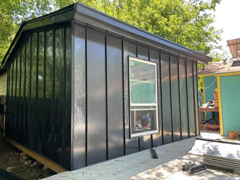 Black standing seam metal wall panels for Metal Roof Installation in Weatherford